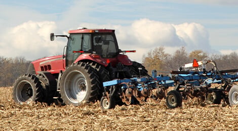 Tractor with Disc/Tiller Attachment
